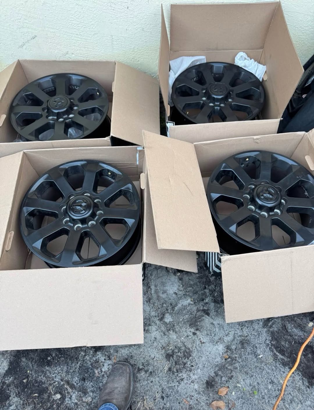 RAM 2500 OEM RIMS WITH BLACK LUG NUTS